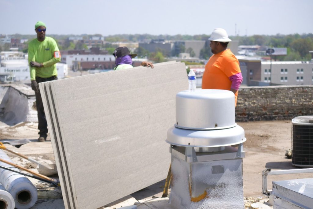 Pinnacle Roofing expert working on a roof